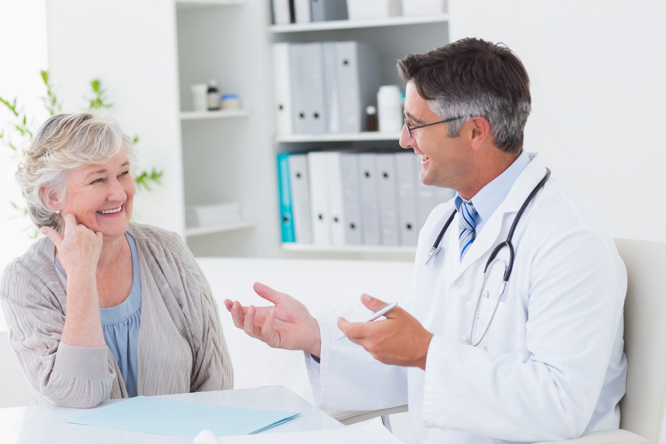old lady discussing with a doctor